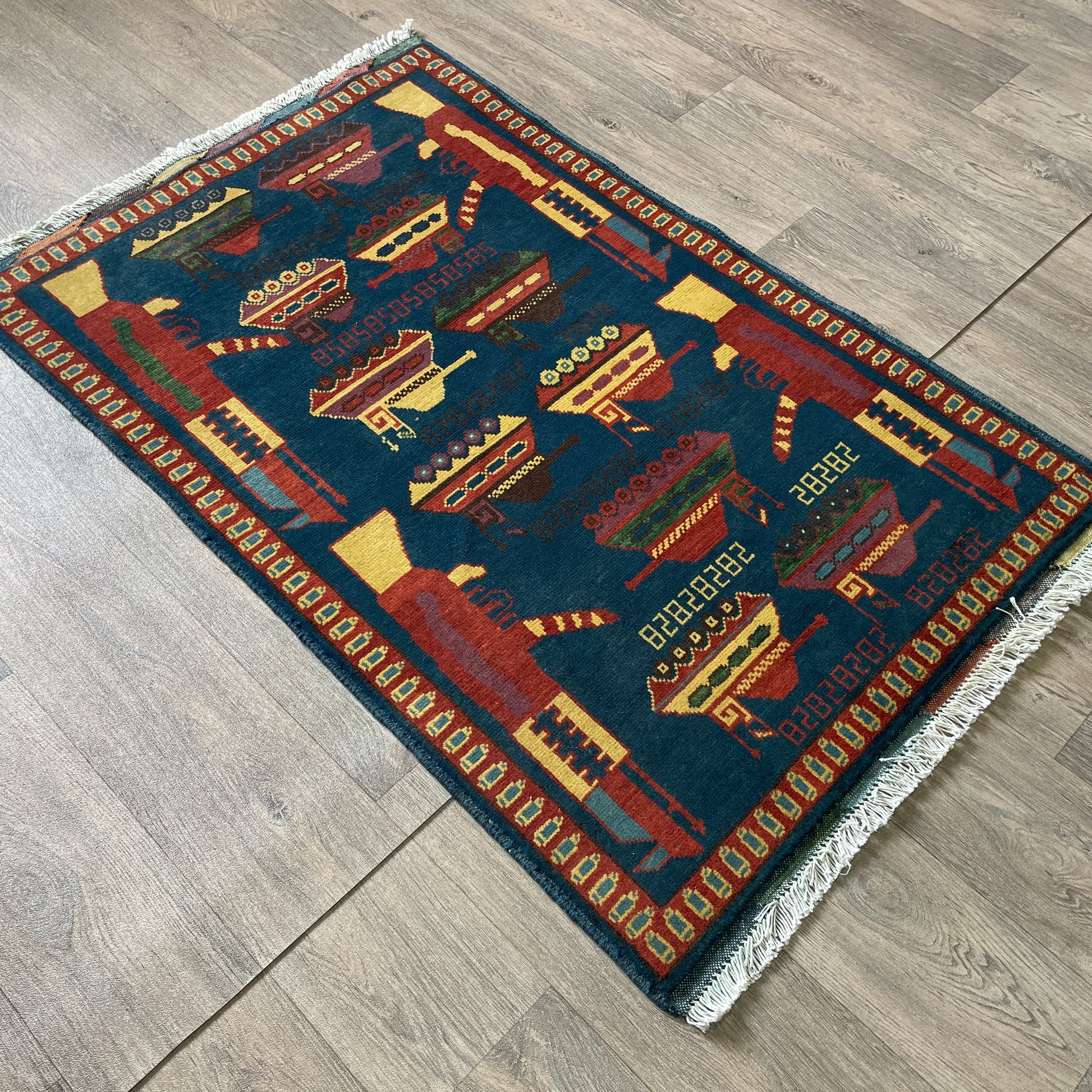 131 x 80 cm | Afghan War Rug