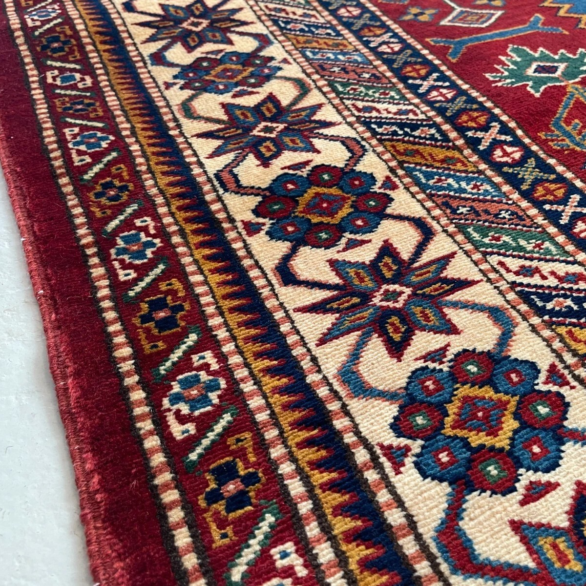 303 x 216 cm | Afghan Super Kazak Rug