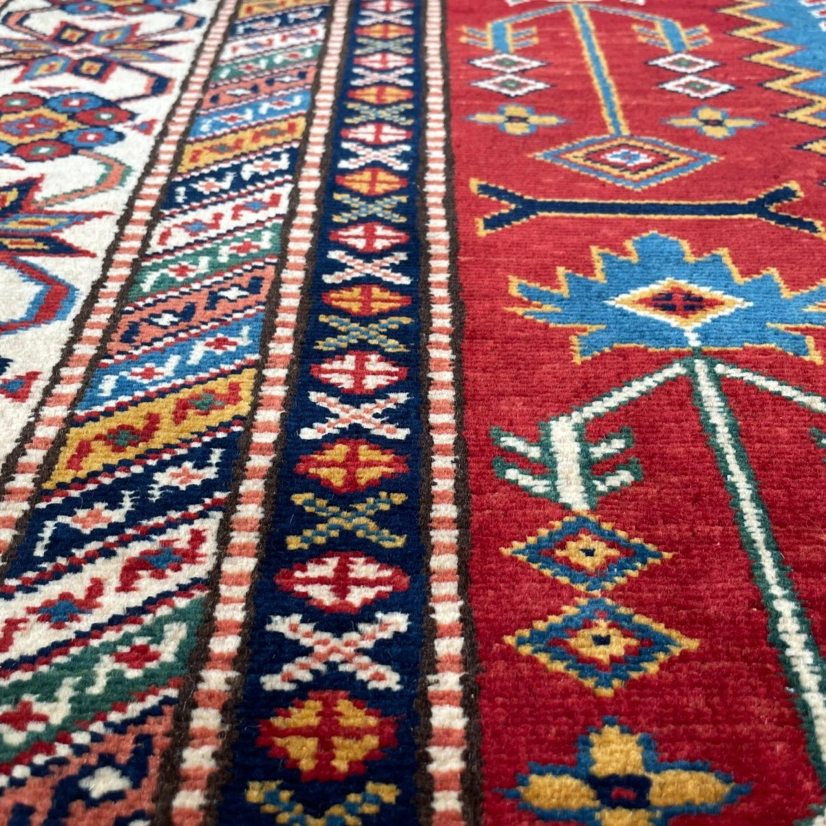 303 x 216 cm | Afghan Super Kazak Rug
