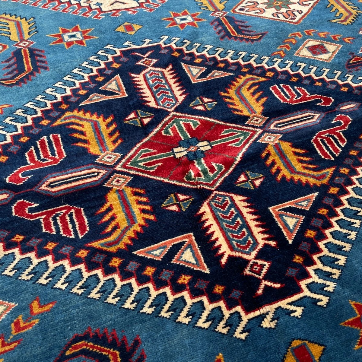303 x 216 cm | Afghan Super Kazak Rug