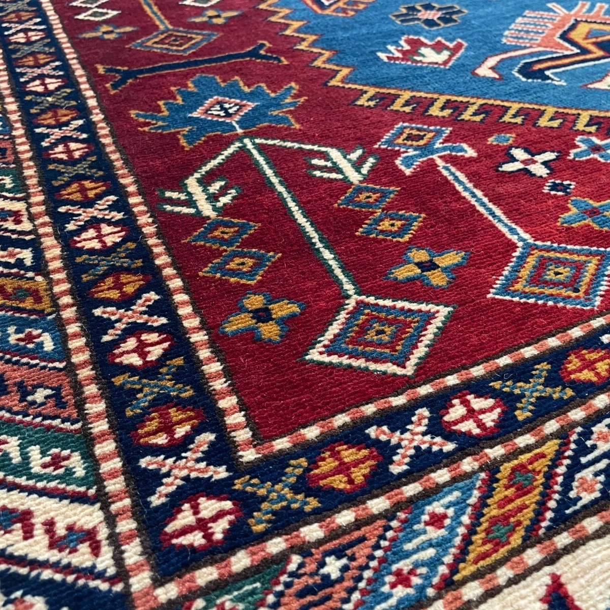 303 x 216 cm | Afghan Super Kazak Rug
